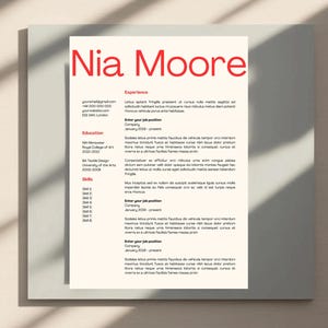 May include: A resume for Nia Moore, with a red header and black text. The resume includes sections for experience, education, and skills. The resume is on a white background.