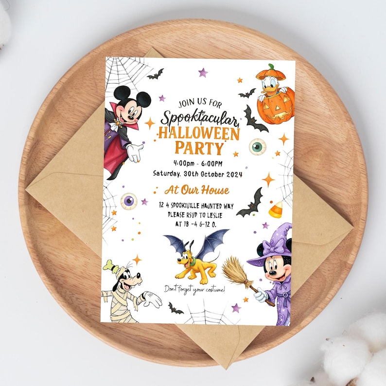 May include: A white Halloween party invitation card featuring Disney characters in costumes, including Mickey as a vampire, Donald in a pumpkin, Goofy as a mummy, Pluto with bat wings, and Minnie as a witch, with text reading Join Us For Spooktacular Halloween Party.