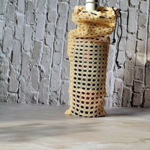 May include: A set of three ceramic mugs with a speckled, matte finish in cream, light grey, and dark grey. Each mug has a simple, minimalist design, ideal for tea or coffee.