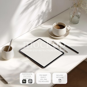 May include: A white desk with a tablet, coffee cup, pens, and a small vase. The tablet is black with a white screen. The coffee cup is filled with coffee. The text on the image says "STEP-BY-STEP INSTRUCTIONS INCLUDED".