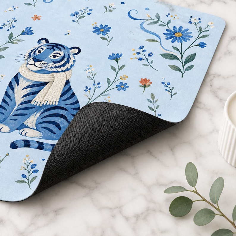Close up of blue tiger mahjong mat with black non slip neoprene backing