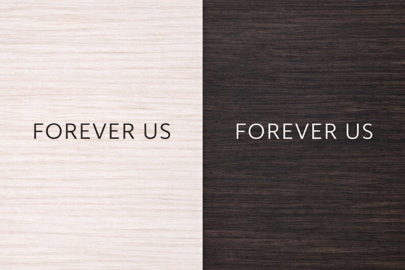 May include: Image split vertically, featuring two wooden panels. The left panel is light-colored, while the right is dark. The text "FOREVER US" is centered on both panels in a simple, sans-serif font, creating a contrast between the text and the background.