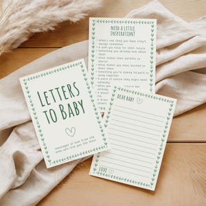 Può includere: Un set di tre biglietti con testo verde e bordi decorativi. I biglietti recitano "Lettere al bambino", "Hai bisogno di un po' di ispirazione?" e "Caro bambino". I biglietti sono progettati per scrivere messaggi a un bambino.