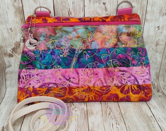 Quilted Tropical cotton batik fabric crossbody embroidered with jungle motif fully lined in 100% cotton with matching removable vinyl strap