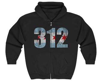 May include: Black zip-up hoodie featuring the number "312" in distressed blue and white, with red star accents, representing the Chicago flag. The hoodie has a front pocket and a hood with a drawstring.