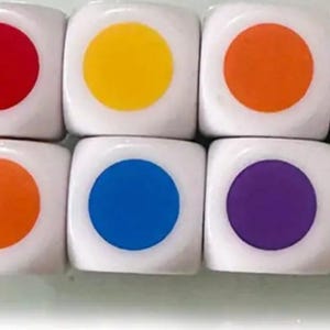 May include: Eight white dice with a single colored circle on each face. The colors are red, yellow, orange, green, orange, blue, purple, and red. The dice are arranged in two rows of four.