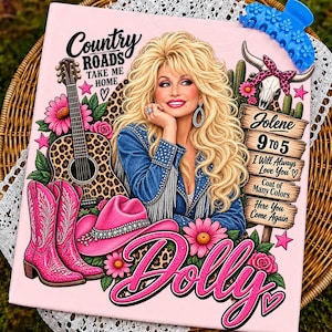 May include: A light pink graphic t-shirt featuring a blonde woman, a leopard print guitar, pink cowboy boots, a pink hat, and a wooden sign with song titles including Jolene, 9 to 5, and I Will Always Love You. The text reads Country Roads Take Me Home.
