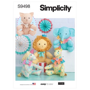 May include: Simplicity sewing pattern S9498 featuring stuffed animal designs. The image shows a cat, elephant, lion, giraffe, and unicorn. Each animal has a unique design, with details like bows and patterned fabrics. The pattern is designed and printed in the USA.