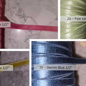 May include: A collage of spools of ribbon in various colors. Includes Bubblegum Pink, Lemon Yellow, and Denim Blue, each labeled with their color and width. Pale Lime ribbon is also shown. Ideal for crafting and gift wrapping.