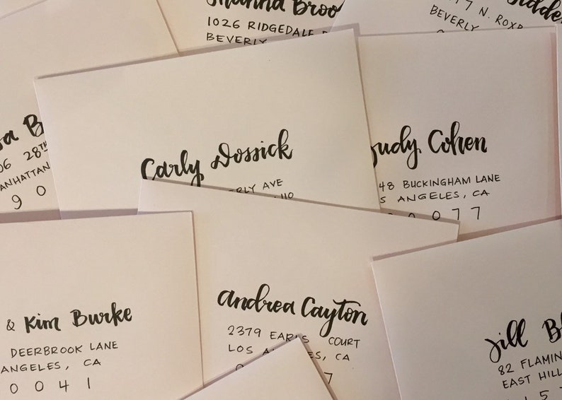 modern calligraphy hand addressed envelopes for wedding or event