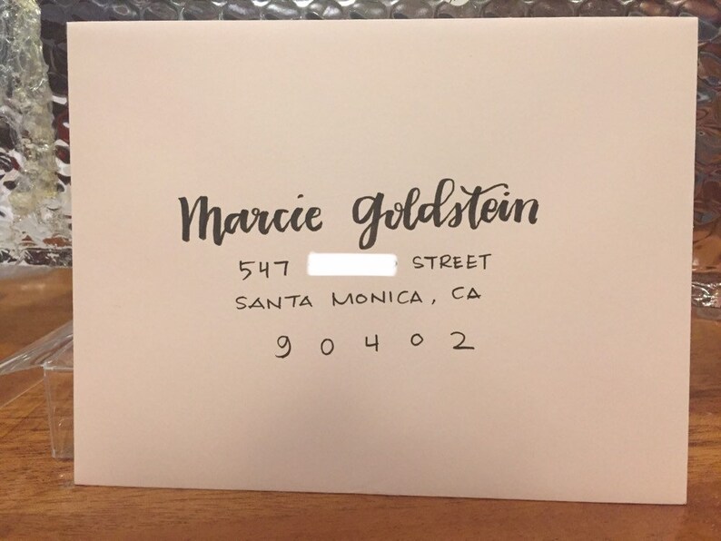 modern calligraphy hand addressed envelopes for wedding or event