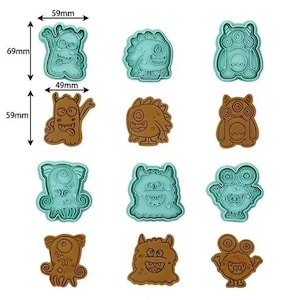 May include: Set of 10 cookie cutters featuring various cartoon monster designs in blue and brown. The cutters are approximately 5 cm in size.