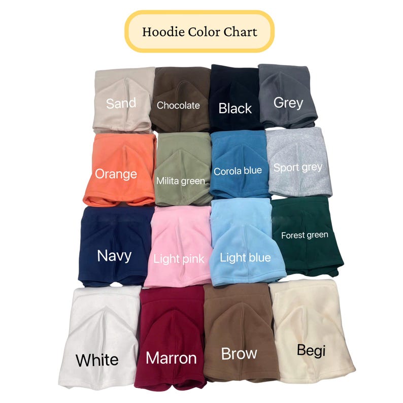 May include: A color chart displaying various hoodie colors. The chart includes colors such as sand, chocolate, black, grey, orange, milita green, corola blue, sport grey, navy, light pink, light blue, forest green, white, marron, brow, and begi.