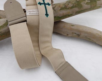 Ultra Suede Guitar Strap with embroidered cross.