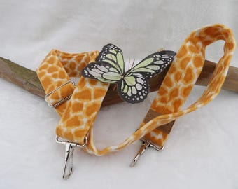 Orange animal print, Handmade Banjo Strap with metal clip ends by Martha Crow