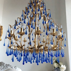 Statement 12 lights chandelier gold leaf finish with sapphire blue Murano glass drops