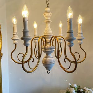One-of-a-kind Florence 6 arms solid brass chandelier, curvy lines, gilt and ivory distressed modern look