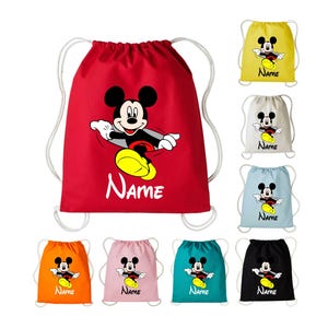 May include: A collection of drawstring bags in red, yellow, white, light blue, orange, pink, teal, and black. Each bag features a graphic of Mickey Mouse and the word Name printed in white or black text, with white cord shoulder straps.