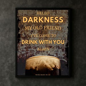 Guinness pint wall art “Hello Darkness” poster mockup leaning on a wooden floor against a neutral wall, rustic tones highlighting the rich foam detail of the pint for a modern home bar or kitchen gallery wall aesthetic.