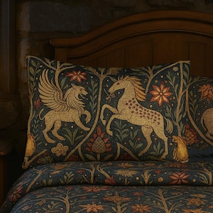 May include: A dark blue bed set featuring a repeating pattern of gold and red mythical creatures, such as winged lions and unicorns. The set includes a pillow and duvet cover, set against a wooden headboard.