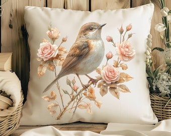 May include: Square decorative pillow with a watercolor illustration of a bird perched on a branch with pink roses. The bird has brown and white feathers. The pillow is off-white and has a soft, inviting appearance.
