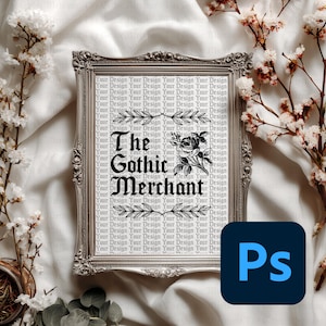 May include: A framed print with the text "The Gothic Merchant" in a gothic font, with a floral design. The frame is silver and ornate. The background is a repeating pattern of the words "Your Design".