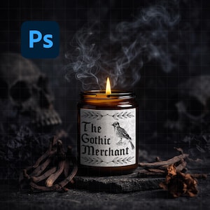 May include: A lit candle in a brown glass jar with a label that reads "The Gothic Merchant" and a bird illustration. Smoke rises from the flame against a dark background. The candle is surrounded by dark-colored objects.