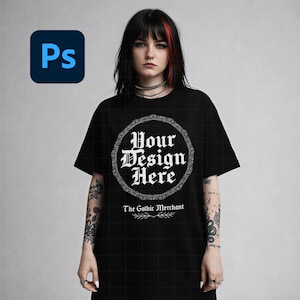 May include: Black t-shirt with the text "Your Design Here" in a decorative white font, encircled by a floral design. The text "The Gothic Merchant" is below. The Adobe Photoshop logo is in the upper left corner.