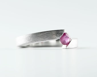 Tension Silver Ruby Ring With an Bypass Tension Set