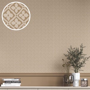 May include: Tan wallpaper with a repeating pattern of small, light brown floral shapes. A close-up shows the pattern in a circular inset. The wallpaper covers the wall behind a white shelf with books and decorative plants.