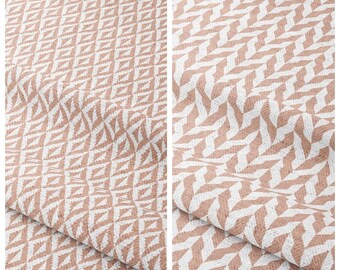 May include: Two fabric samples with geometric patterns. The left sample, labeled "Salmon Berry," features a diamond pattern in white and a salmon-pink color. The right sample, labeled "Polly Petunia," has a chevron pattern in the same colors.
