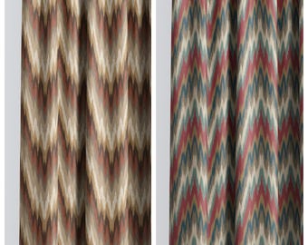 May include: Two patterned curtain panels. The left panel, labeled "BUCKAROO", features a chevron design in shades of brown, beige, and red. The right panel, labeled "ROCK TREE", displays a similar chevron pattern in red, blue, and green.