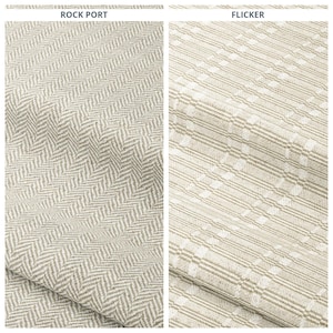 May include: Two fabric samples, one with a herringbone pattern and the other with a striped design. The herringbone fabric is a light beige colour, while the striped fabric has a similar beige tone with white accents. The text "ROCK PORT" and "FLICKER" are visible.