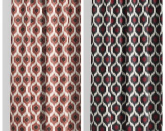 May include: Two patterned curtain panels. The left panel is titled "SCARLET GRACE" and features a repeating geometric design in red, brown, and white. The right panel, titled "VILLAGE EVENING," has a similar pattern in dark red, black, and white.