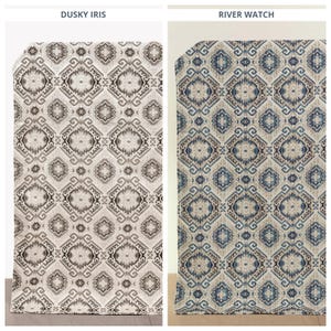 May include: Two fabric swatches with a geometric pattern. The swatch on the left is a light brown with a darker brown pattern. The swatch on the right is a light blue with a darker blue pattern. The text "Dusky Iris" is above the left swatch and the text "River Watch" is above the right swatch.