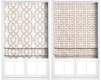 May include: Two window treatments with geometric patterns. The left window treatment is labeled "Summer Crush" and features a repeating trellis design in beige and white. The right window treatment, labeled "Blanched Coral," has a repeating square pattern in beige and white.