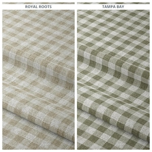 Puede incluir: Dos muestras de tela, una con un patrón de cuadros beige y crema, la otra con un patrón de cuadros verde y crema. El texto "ROYAL ROOTS" está encima de la muestra beige y "TAMPA BAY" encima de la verde.