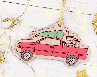 Twister pick up truck Dorothy Christmas ornament