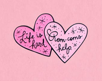 Life is hard. Rom-coms help. enamel lapel pin