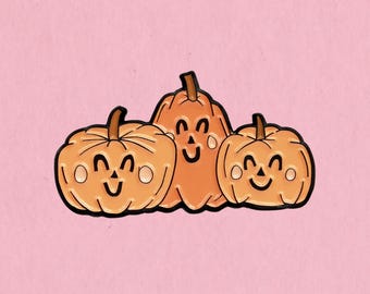 Höstlig Halloween-emaljnål med pumpor och klappstav