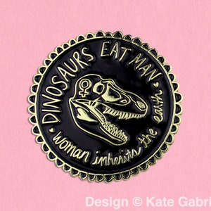 Jurassic Park dinosaurs eat man woman inherits earth enamel lapel pin / Buy 3 Pins Get 1 Free with code PINSGALORE / Black and Gold