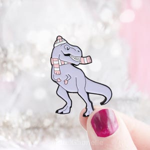 T-Rex dinosaur in mittens enamel lapel pin