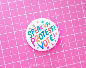 Speak Up, Protest, Vote button pin