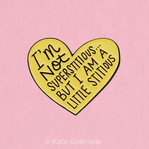 Superstitious The Office Michael Scott quote enamel lapel pin