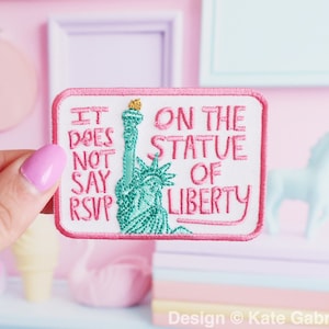 It does not say RSVP on the statue of liberty - Clueless pro immigration patch