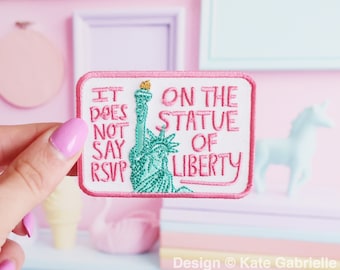It does not say RSVP on the statue of liberty - Clueless pro immigration patch