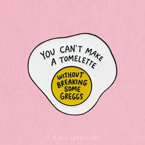 You can&#39;t make a Tomelette without breaking some Greggs / Succession enamel lapel pin