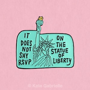 It does not say RSVP on the statue of liberty / Pro immigration enamel lapel pin
