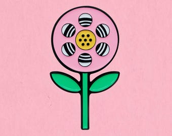 Film reel flower enamel lapel pin
