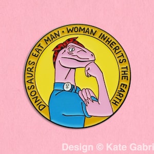 Dinosaurs eat man woman inherits earth / Jurassic Park quote enamel lapel pin
